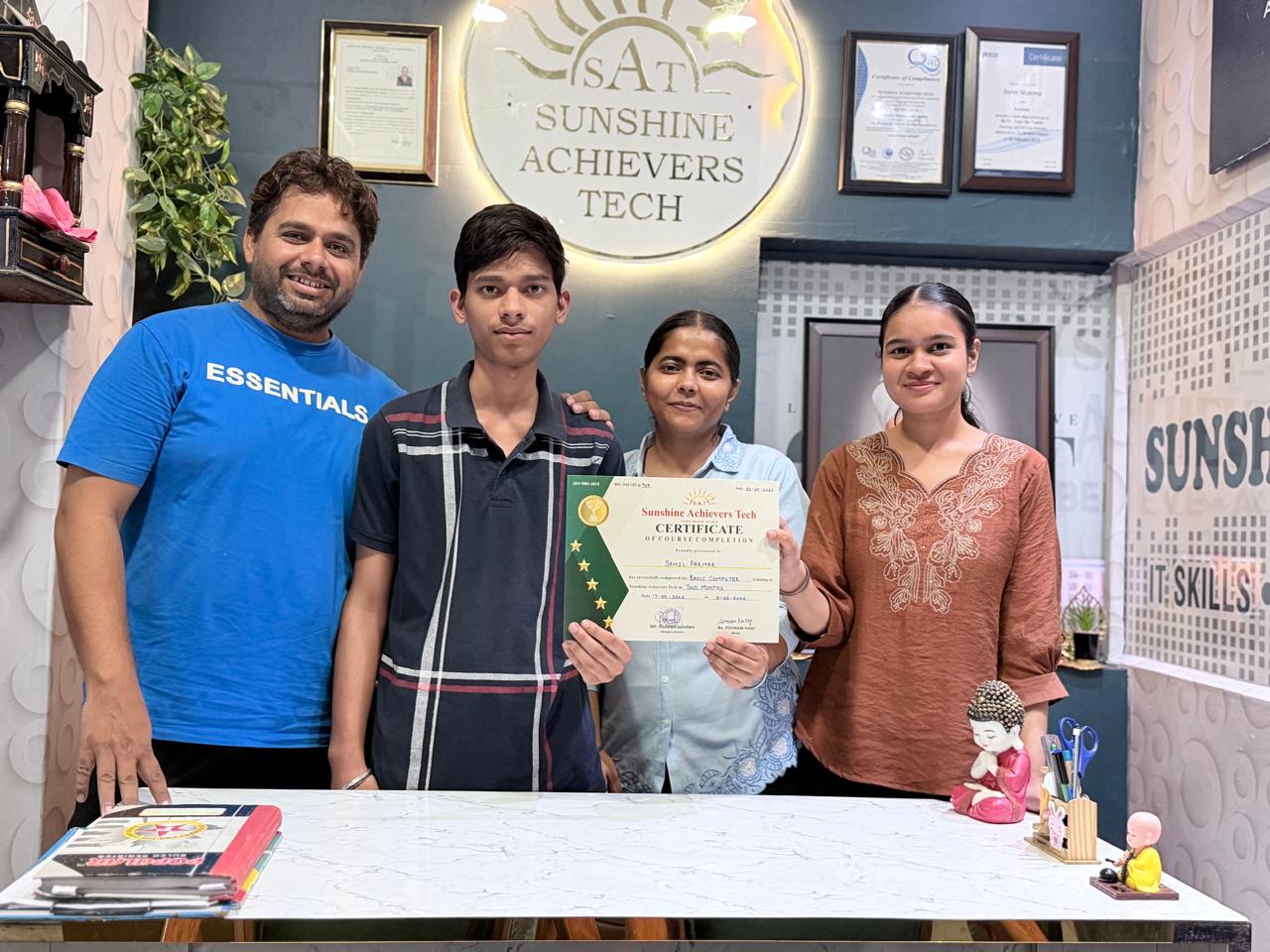 Sahil Parmar receives his Basic Computer Course completion certificate from Sunshine Achievers Tech, celebrating digital skills and student success in Phagwara